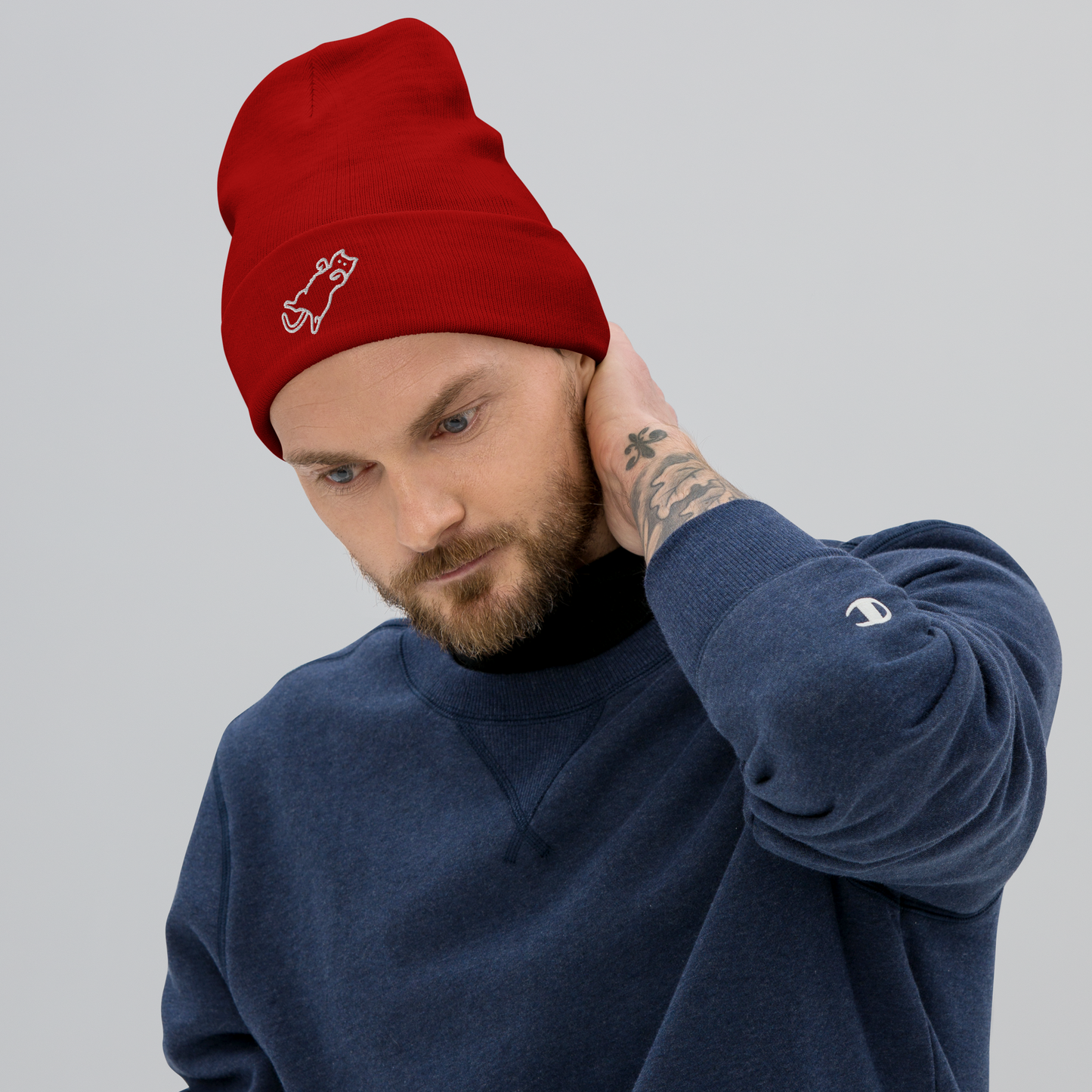 Guy in crewneck with cat on back beanie - red