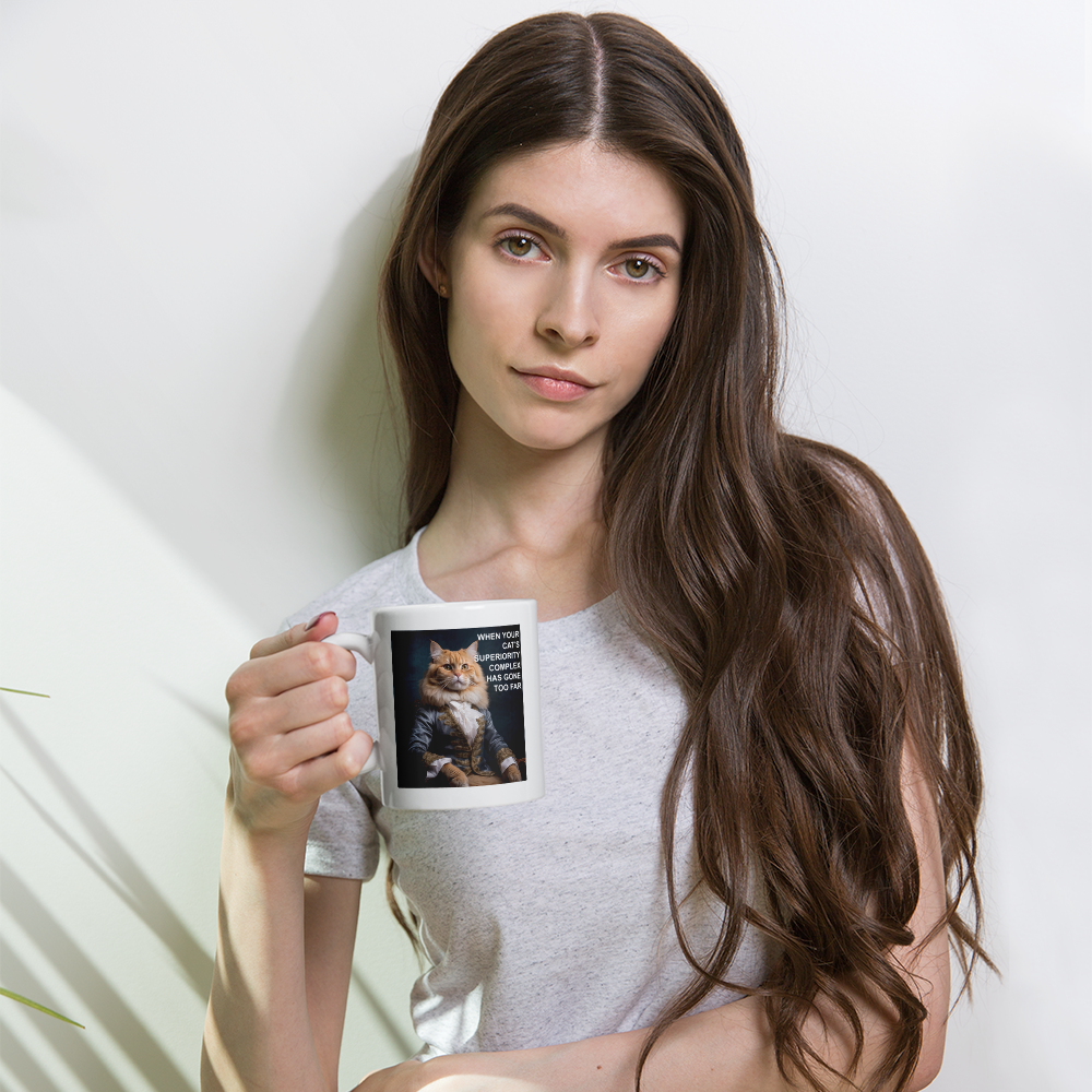 Woman holding a mug with a cat design against a plain background - all