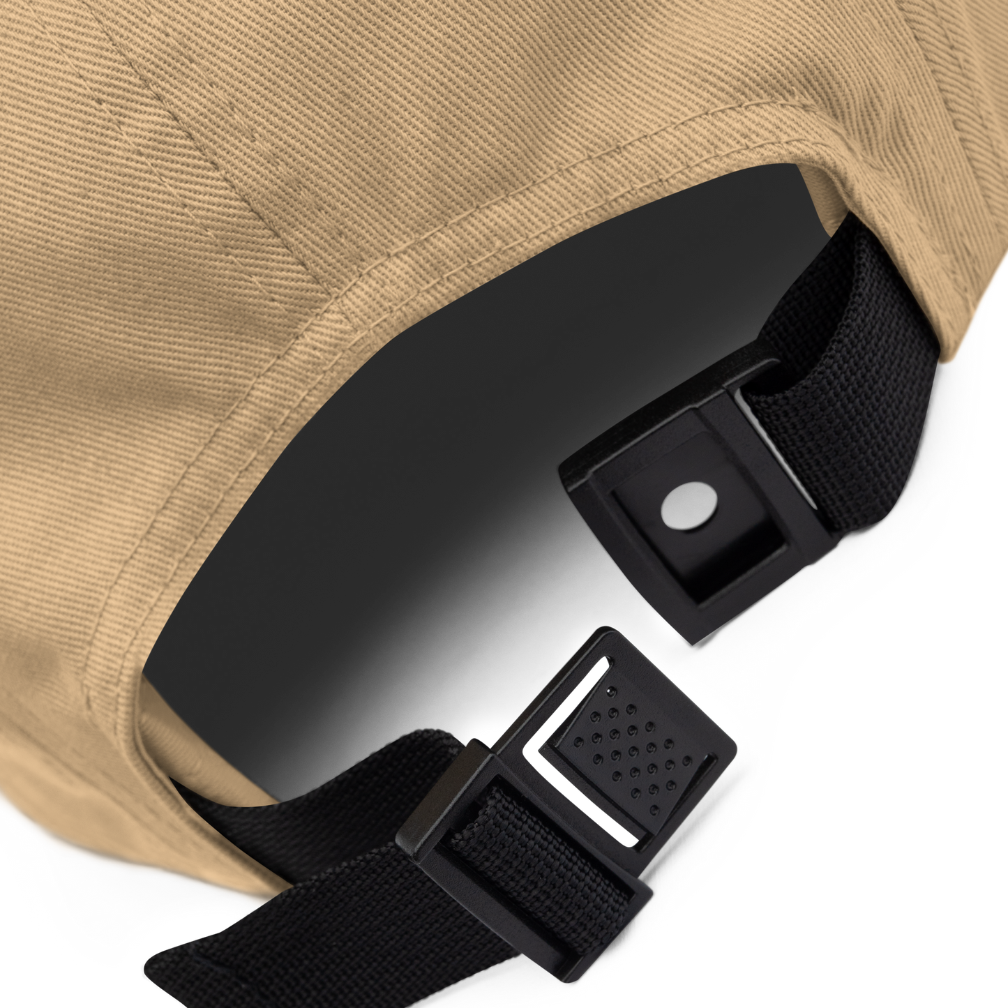Close-up of a beige cap with black adjustable straps on a white background - khaki