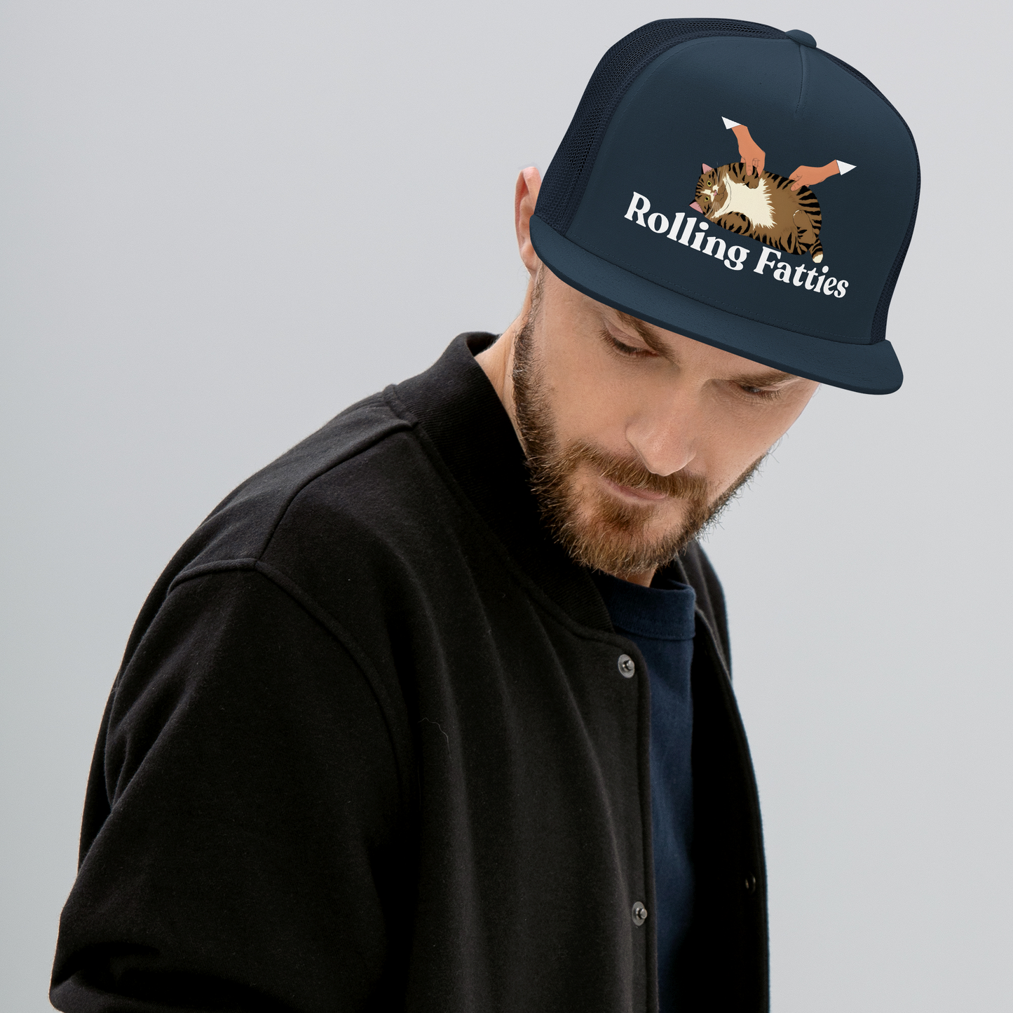 Man wearing a cap with 'Rolling Fatties' logo - navy