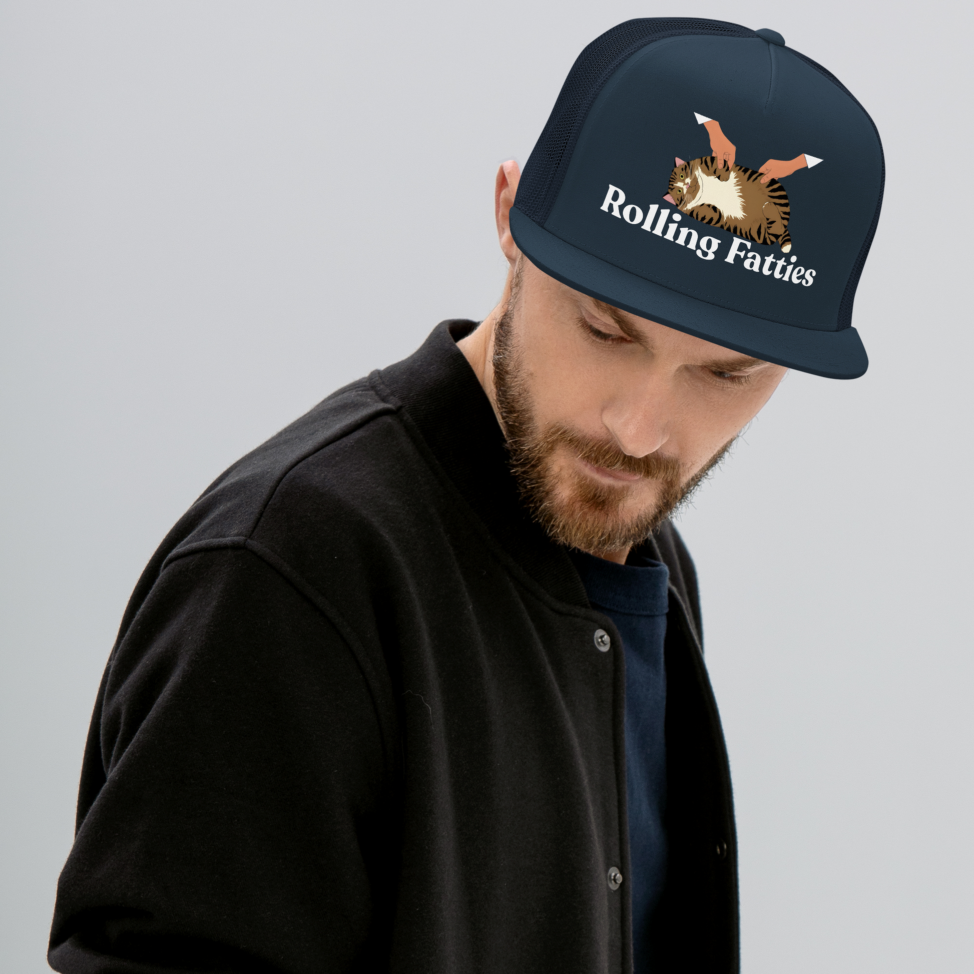 Man wearing a cap with 'Rolling Fatties' logo - navy