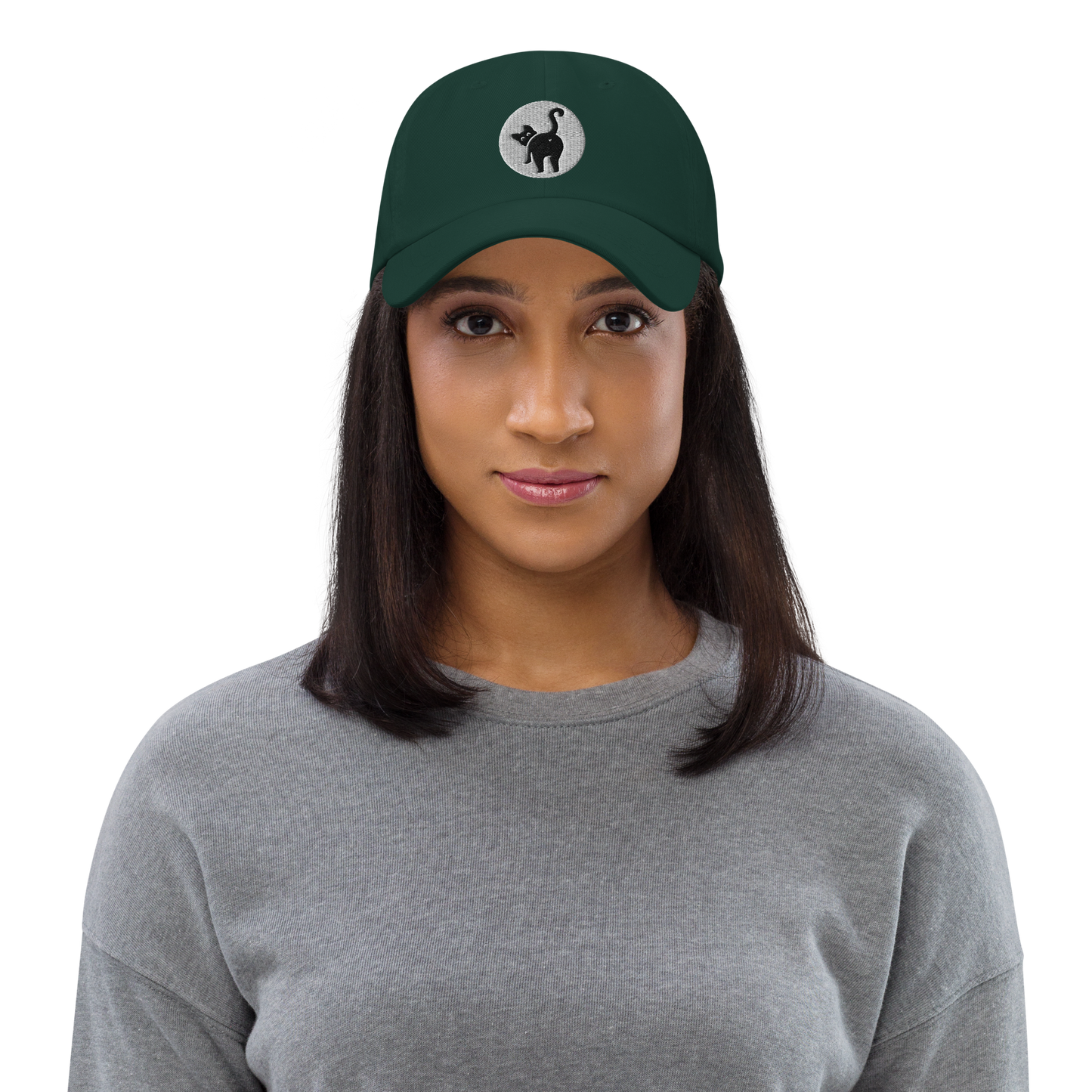 Woman wearing a green cap with a logo on a white background - spruce
