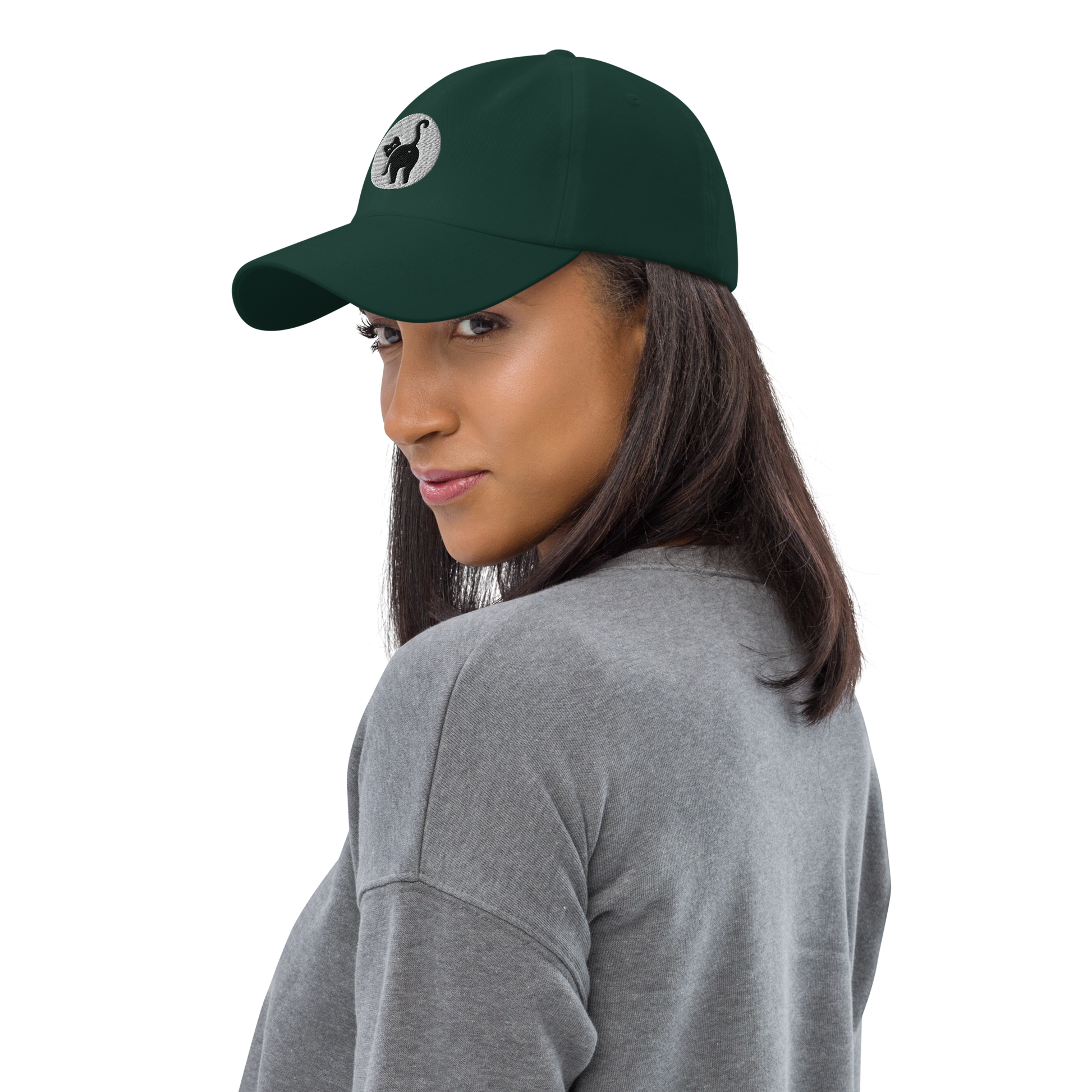 Woman wearing a green cap with a logo on a white background - spruce