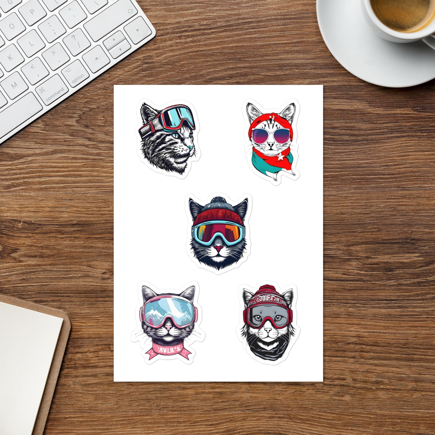A sticker sheet with snowboarder cat heads