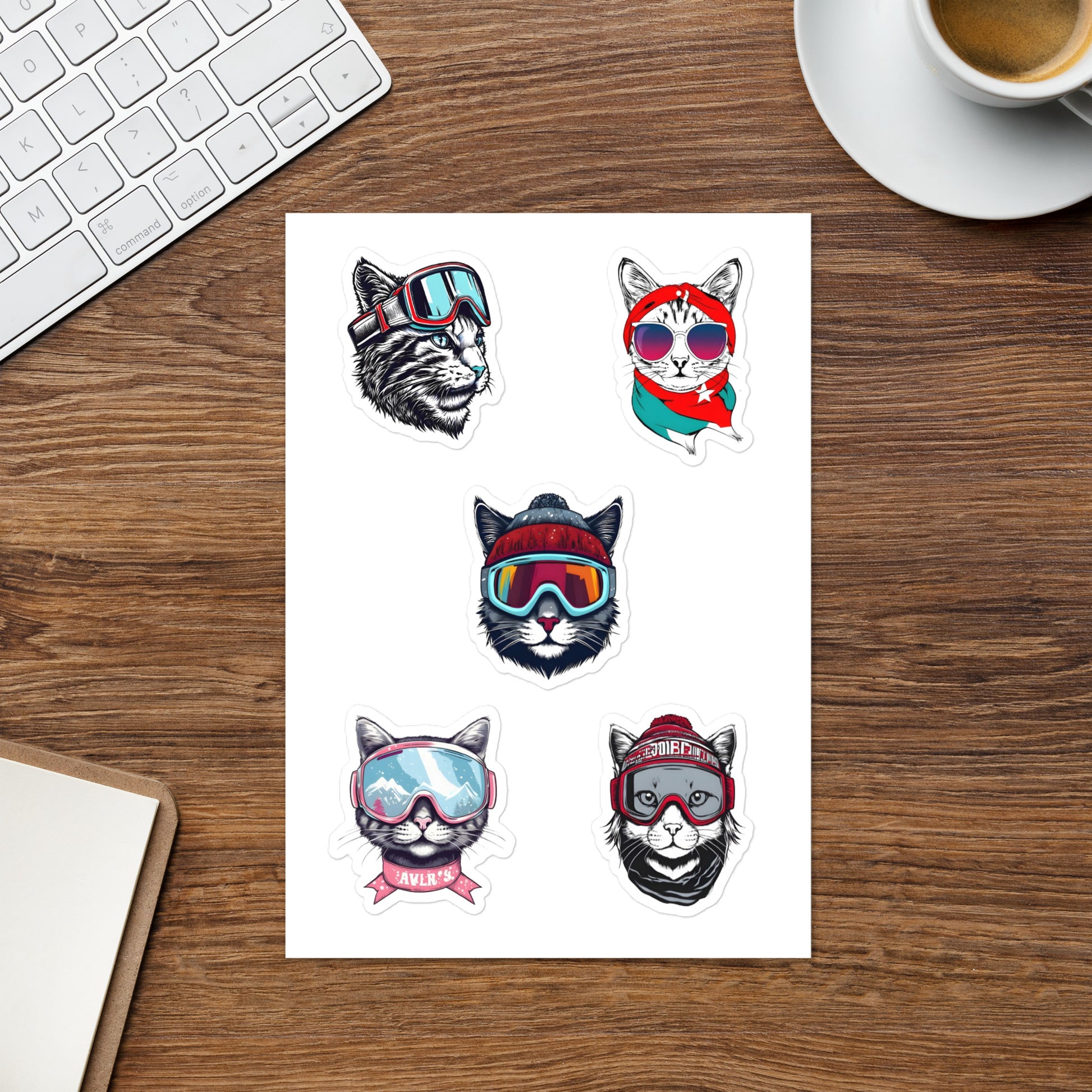 A sticker sheet with snowboarder cat heads