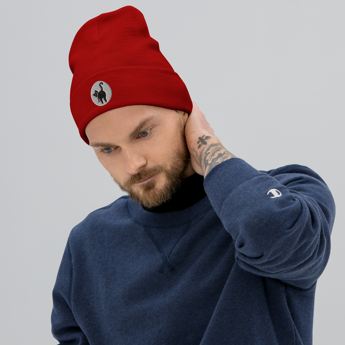 Guy in crew neck and Cat But Beanie - red