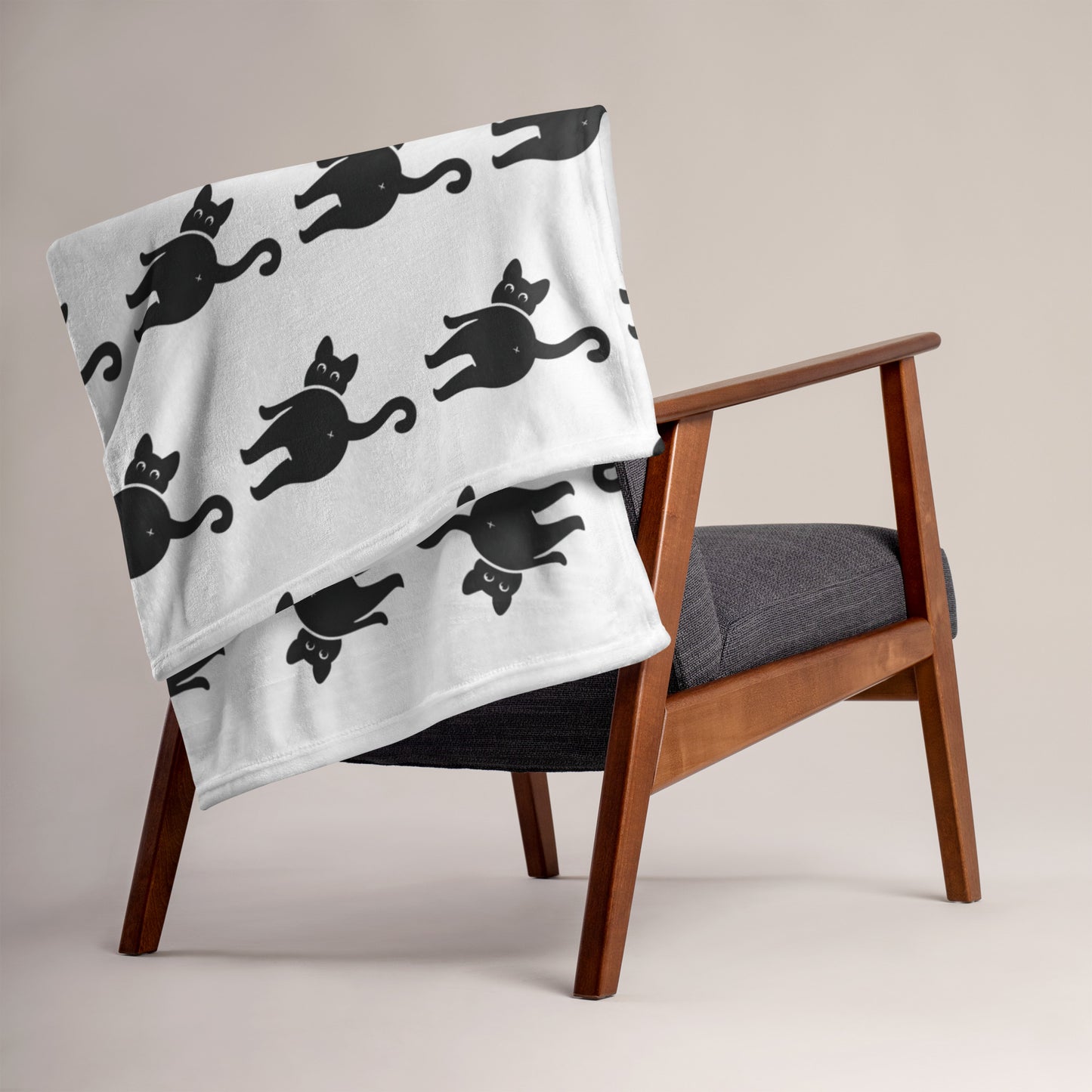 Cat butt blanket on the back of a chair - all