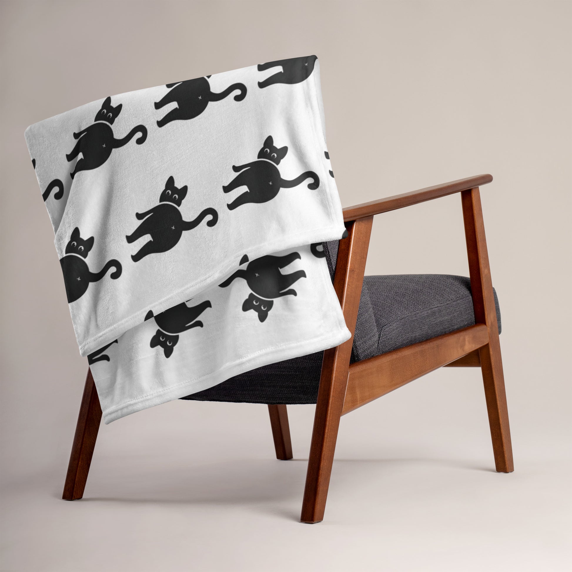 Cat butt blanket on the back of a chair - all