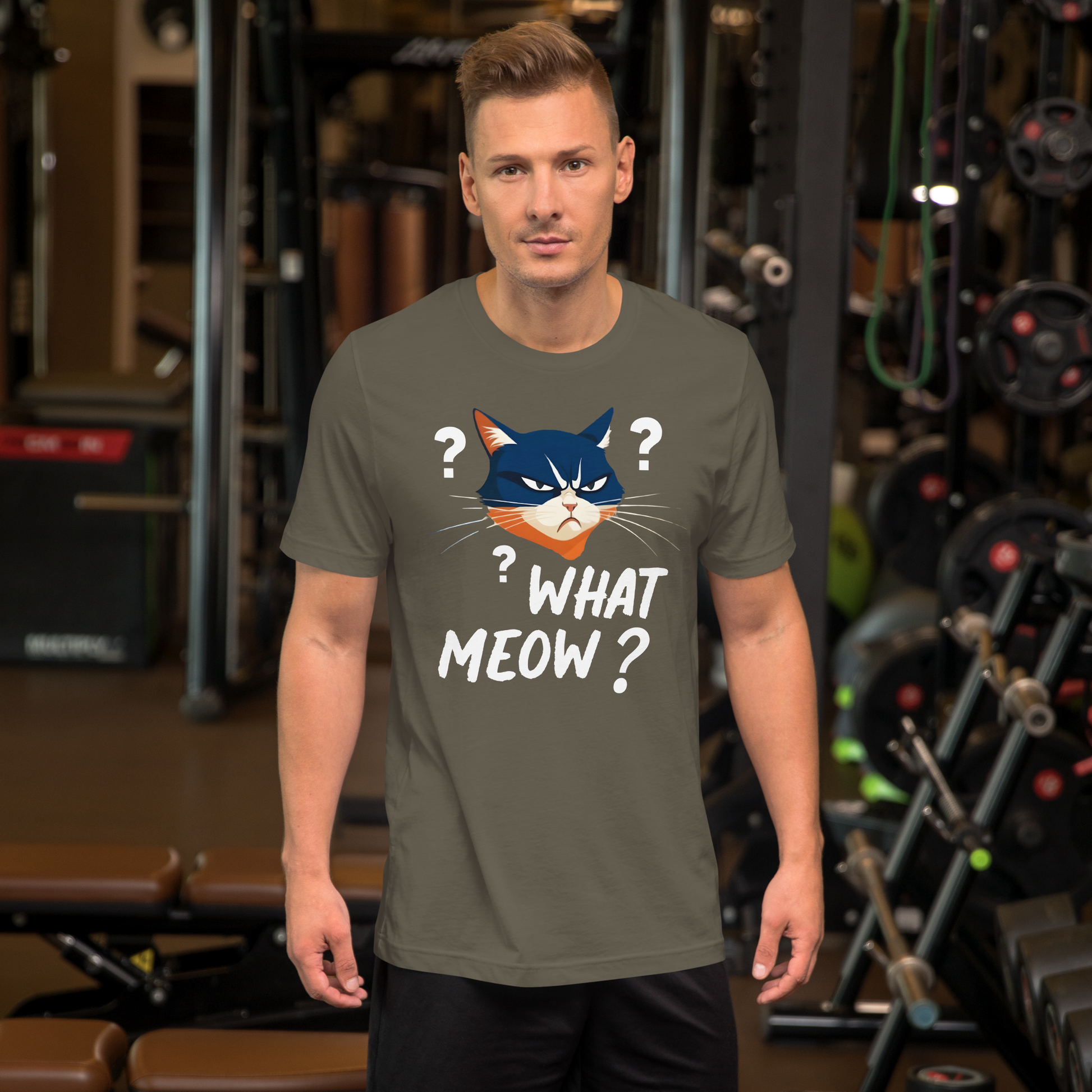 Man wearing a t-shirt with a cat graphic and text in a gym setting - army