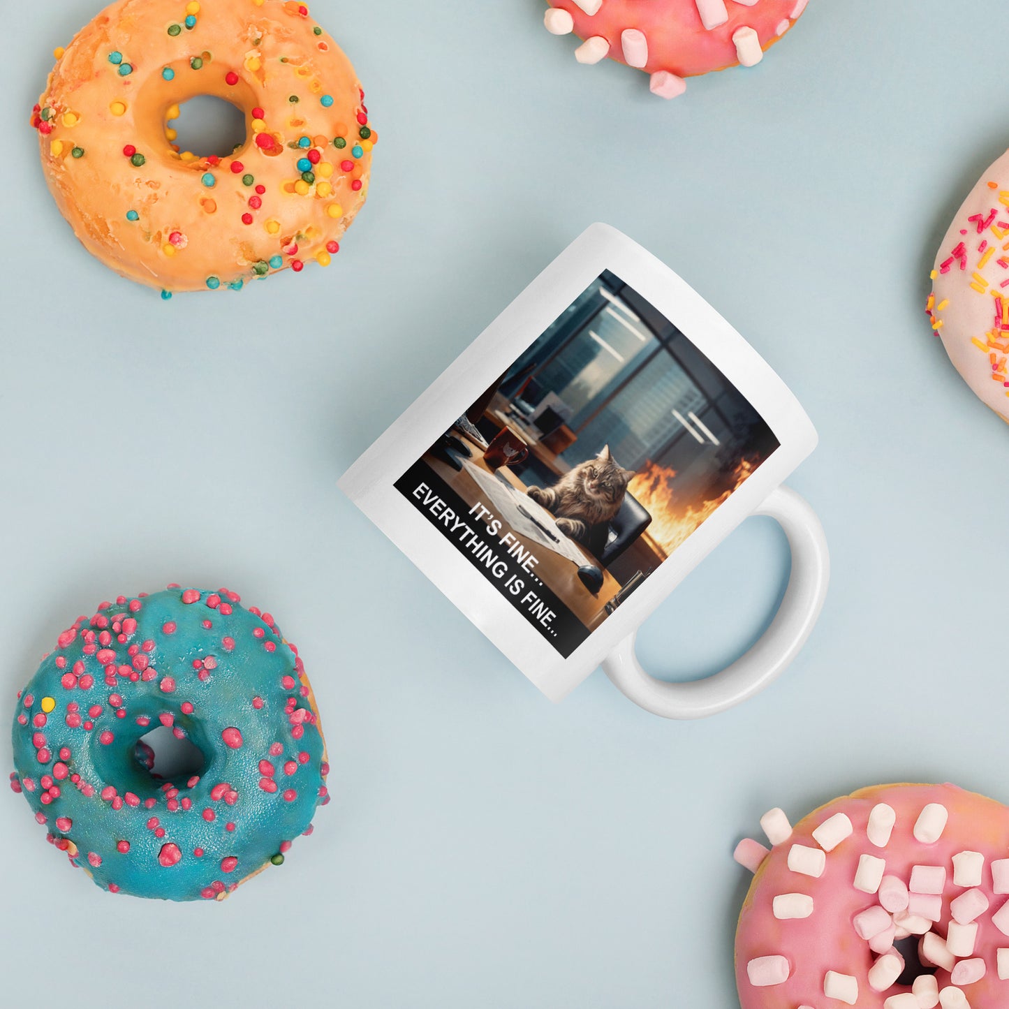 A mug with a meme of a cat drinking his coffee in a burning building saying that everything is fine - with donuts - 11 oz