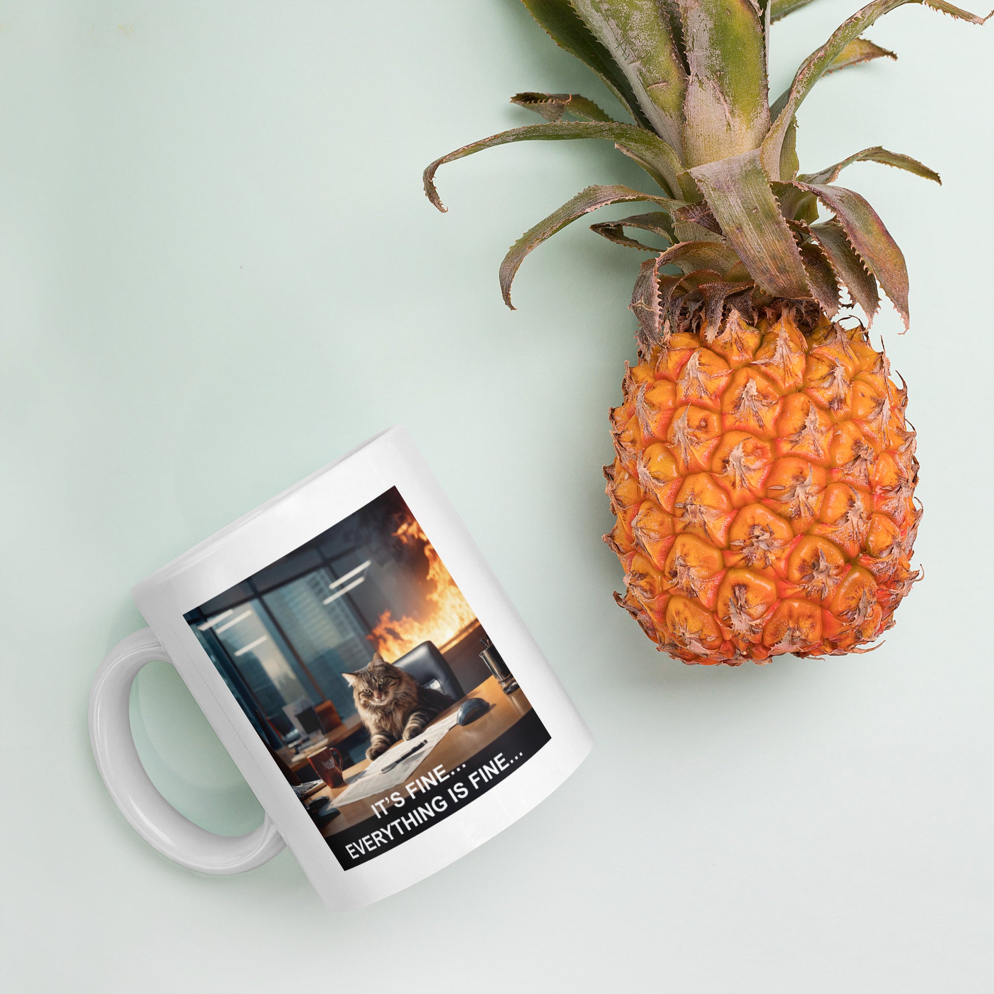 A mug with a meme of a cat drinking his coffee in a burning building saying that everything is fine - with pinapple - 11 oz