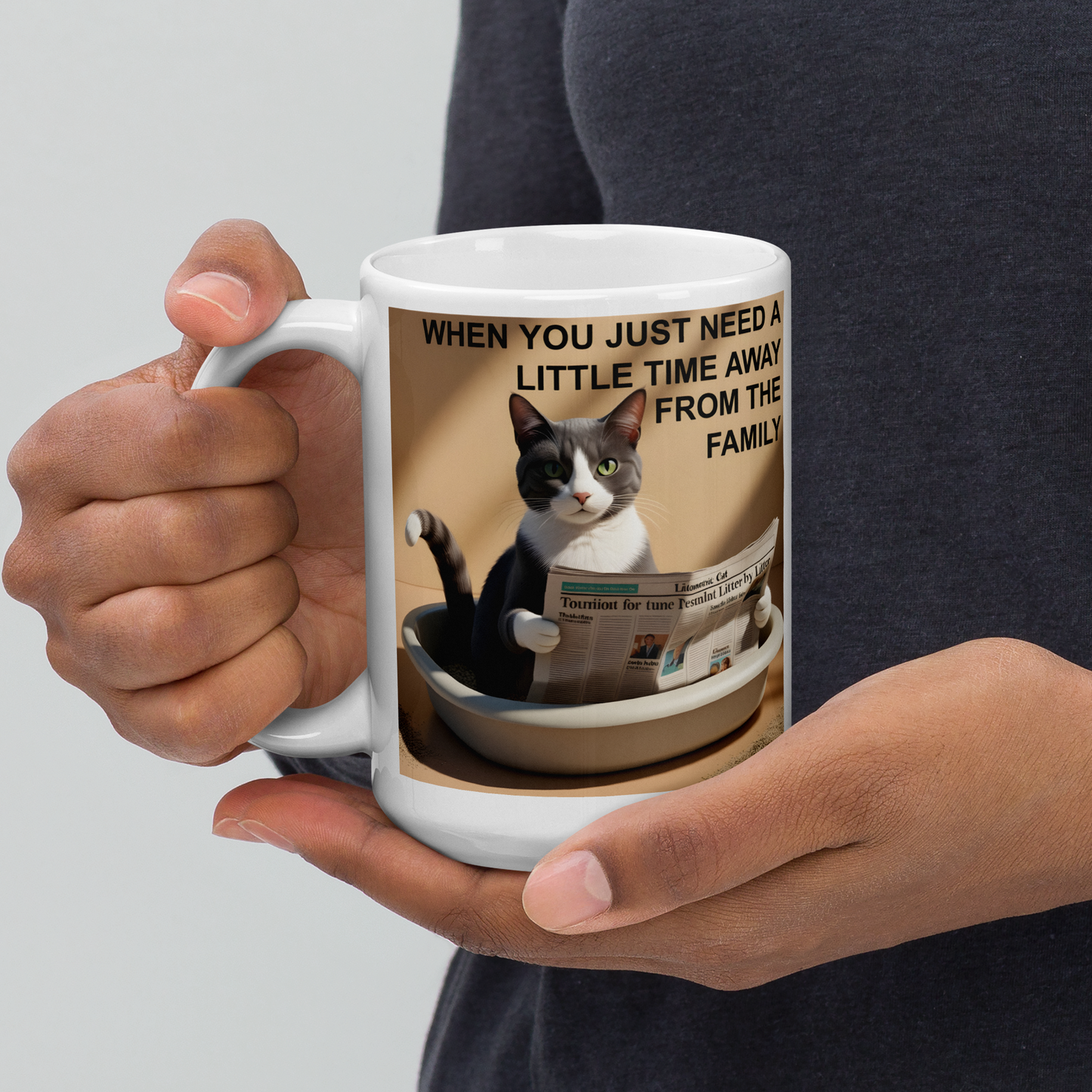 Person holding a mug with a cat design and text on a plain background - 15 oz